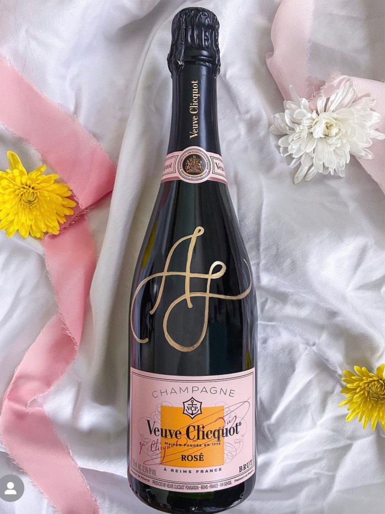 Hand Lettering Monogram on Champagne Bottle Hand Lettering Monogram on Champagne Bottle