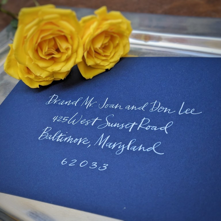 Houston Calligraphy and Engraving The Beaux Arts blue envelope white ink script 1 768x768