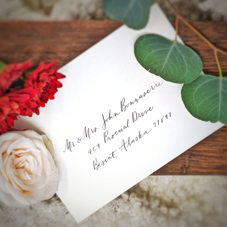 Houston Texas calligraphy and engraving live events The Beaux Arts white envelope bescat script 768x768