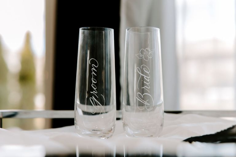 The MB Studio Tricities WA Calligrapher Engraver Live Event Artist Champagne Glasses Bride Groom Personalized Hand Lettered Floral 768x512